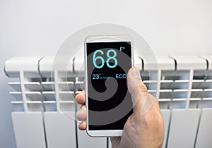Adjusting temperature on thermostat with smartphone