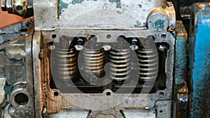 Adjustment of the valves of diesel fuel system injectors, close-up