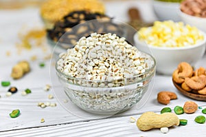 Adlay millet or pearl millet white Job`s tears on bowl - Coix Lachrymal adlay jobi with different whole grains beans and legumes