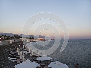 Adler city/ Russia - August 2019: Sunset under the seafront of Adler city