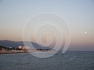 Adler city/ Russia - August 2019: Sunset under the seafront of Adler city