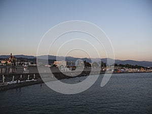 Adler city/ Russia - August 2019: Sunset under the seafront of Adler city