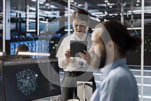 Admin in data center using tablet to update storage arrays software