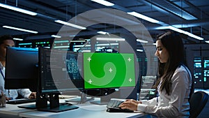 Admin using AI tech on isolated screen PC to do maintenance in server room