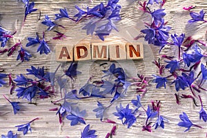 Admin on the wooden cubes