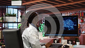 Admin writing artificial intelligence code on computer