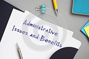 Administrative Issues and Benefits inscription on the piece of paper