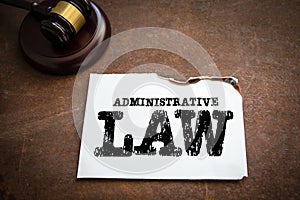 Administrative Law concept. Judge's gavel on a rusty metal background