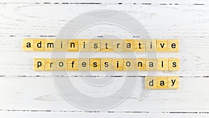 Administrative Professionals Day.words from wooden cubes with letters photo