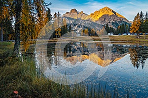 Admirable autumn sunrise landscape with Antorno lake in Dolomites, Italy