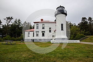 Admiralty Head Lighthouse at Fort Casey State Park in Washington during summer.