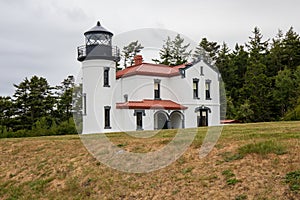 Admiralty Head Lighthouse at Fort Casey State Park in Washington during summer.