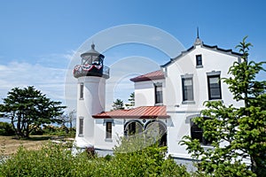 Admiralty Head Lighthouse on Whidbey Island overlooking the Puget Sound of Washington State. Light house is decorated for the