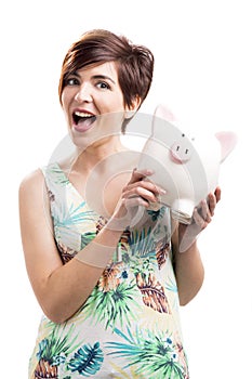 Admired woman with a piggy bank