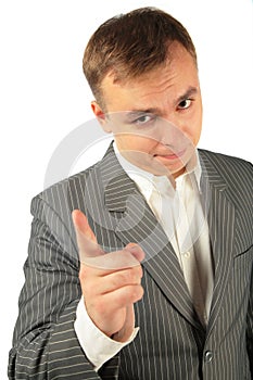 Admonishing businessman by finger