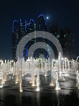 ADNOC building in Abu Dhabi at night