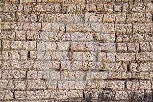 Adobe bricks wall made of mud and straw
