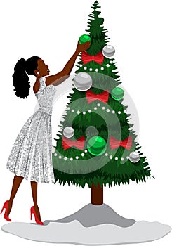Black Woman in White Sparkling Dress Decorates Christmas Tree photo