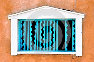 Adobe and Turquoise Window