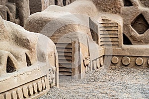 adobe walls and decorations in the archaeological site of Chan Chan made by the Chimu civilization near Trujillo, Peru