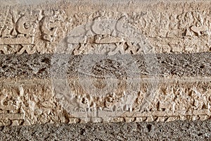 adobe walls and decorations in the archaeological site of Chan Chan made by the Chimu civilization near Trujillo, Peru