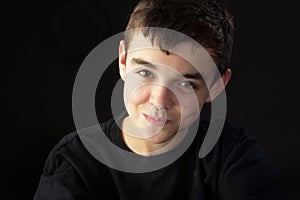 An Adolescent Boy Refusing to Laugh photo