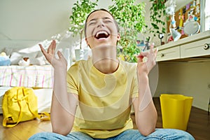 Adolescent teenage girl student having video call, looking at webcam