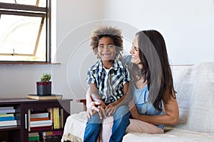 Adopted child playing with mother photo