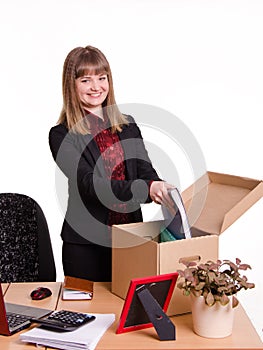 Adopted in office girl puts her things out of the box