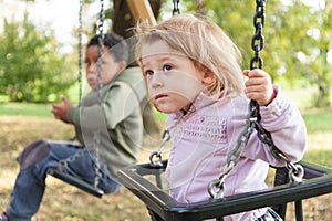 Adoptive brothers on the swing