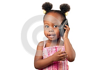 adorable african american girl talking to the phon