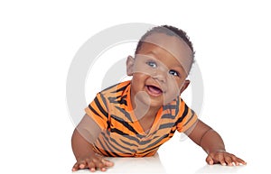 Adorable african baby lying on the floor