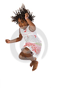 Adorable african girl jumping