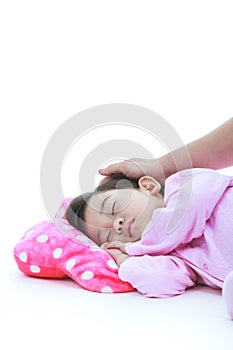 Adorable asian child sleeping peacefully, isplated on white back