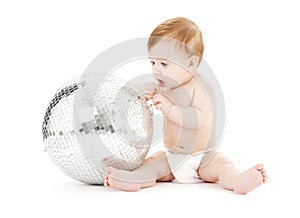 Adorable baby boy with big disco ball