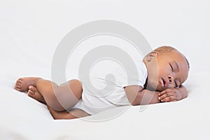 Adorable baby boy sleeping peacefully