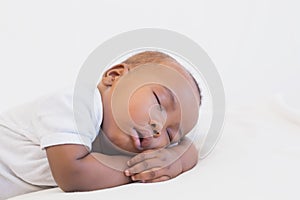 Adorable baby boy sleeping peacefully