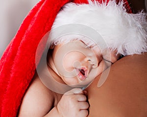 Adorable Baby in Christmas Santa Hat