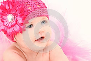 Adorable Baby Girl in Flower Hat