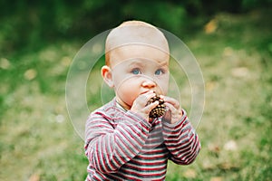 Adorable baby girl playing outside