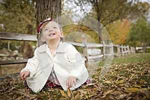 Adorable Baby Girl Playing in Park