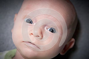 Adorable Baby With Large Blue Eyes