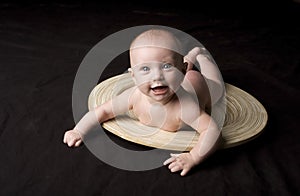 Adorable Baby Laying On Stomach