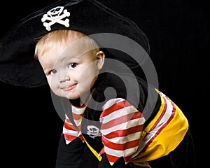 Adorable baby in a pirate costume.