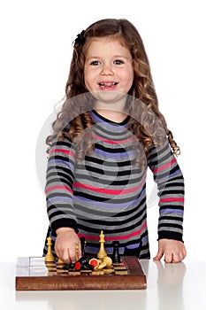 Adorable baby playing chess