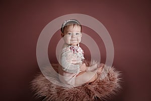 adorable baby posing with heart