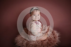 adorable baby posing with heart