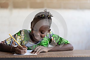 Adorable Black Ethnicity Child Writing Pencil Paper School