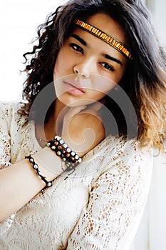 Adorable black skined african teenage girl dressed like hipster hippie, vintage portrait, lifestyle people concept