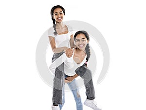 Adorable black twin teen girl on studio white background